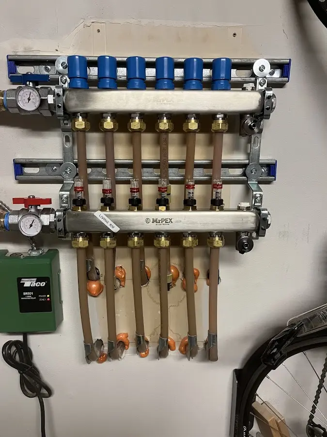 Plumber performing Water Heater Repair at a residential property in Gautier